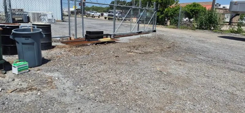 Commercial gravel lot swept clean after debris removal